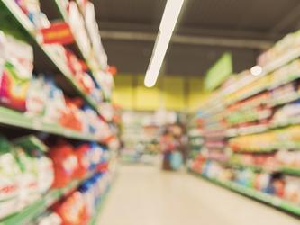 blurred supermarket shelves